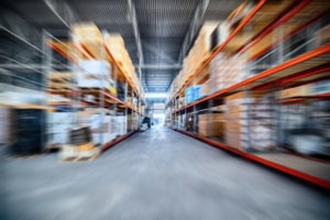 Blurred image of large warehouse