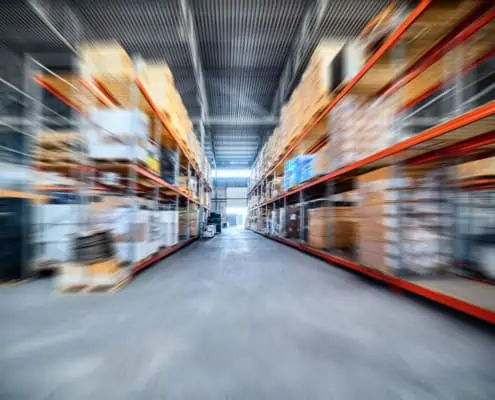 Blurred image of large warehouse