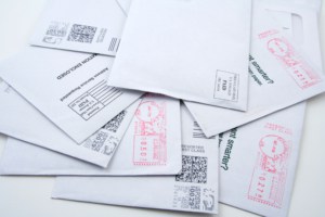 Pile of paid postage envelops