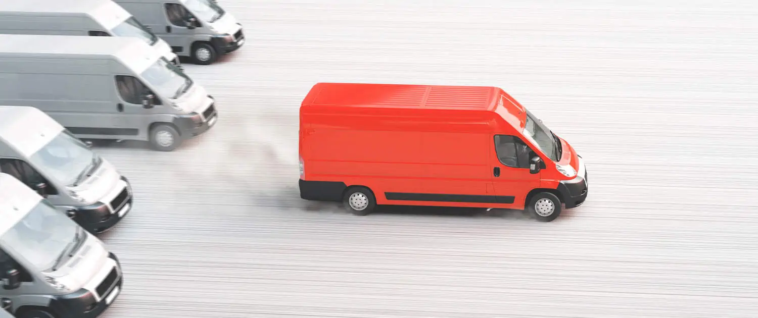 Overhead view of a red van on urgent delivery