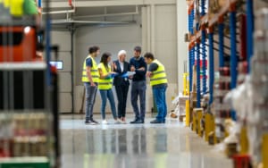 View of a warehouse team looking at clipboard