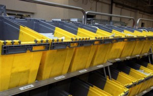 Close up view of flat letter sorting bins in warehouse