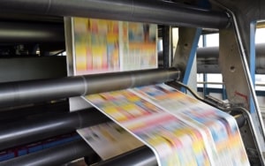 Offset printing machine being used to print materials