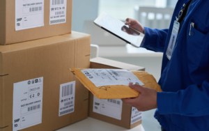 View of a worker sorting different packages