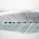 Side view of stacked letters on white background