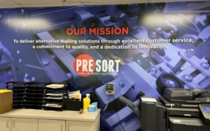 Presort Inc. mission statement on the wall of their office