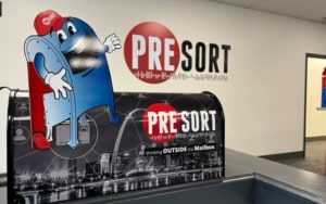 Mailbox with the Presort Inc. logo