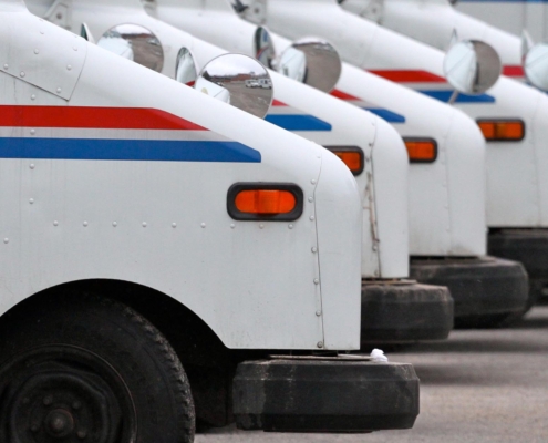 Mail trucks parked in lot
