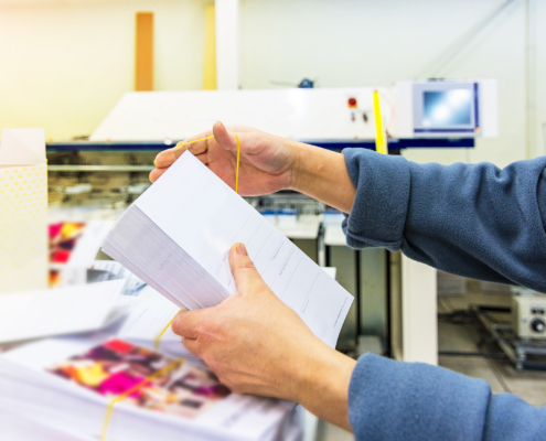 worker orangizes direct mail