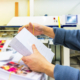 worker orangizes direct mail