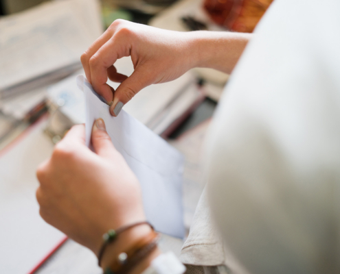What It Costs to Mail a Postcard in 2026, by Size and Mail Class